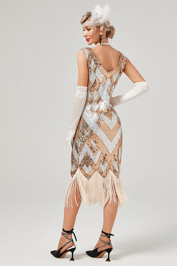 Paillettes dorate abito anni '20 con frange